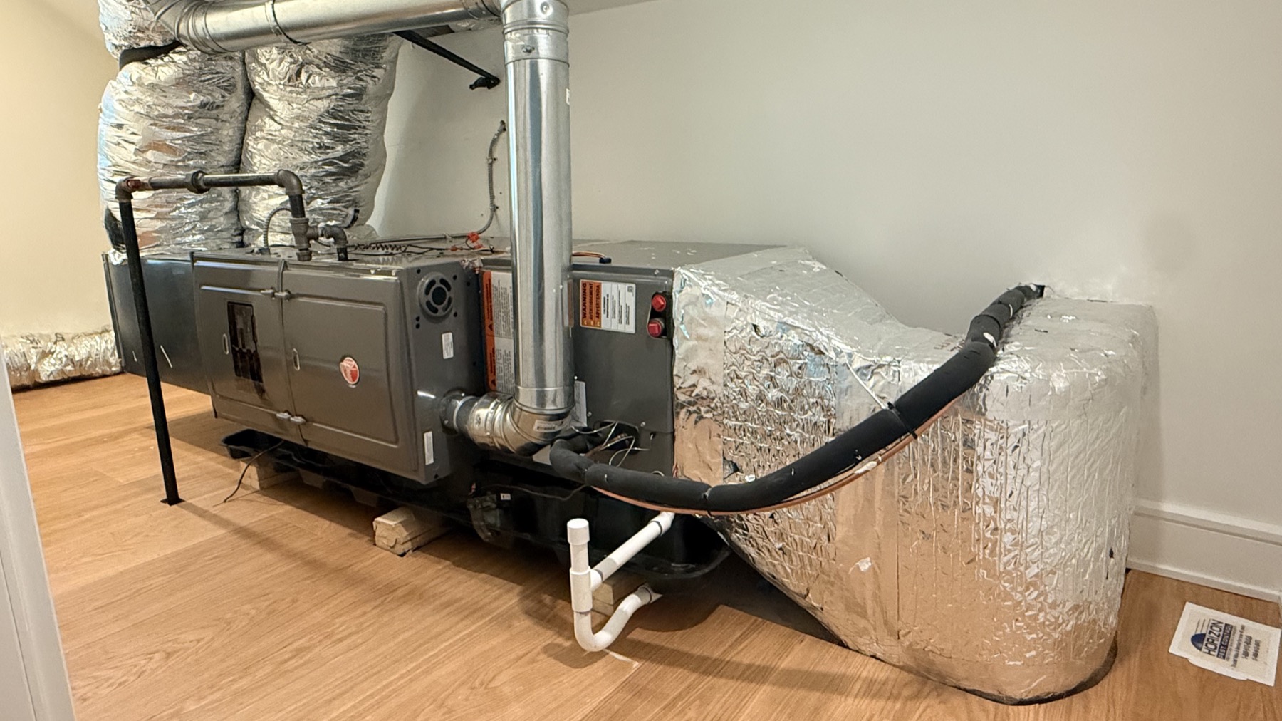 Installed residential furnace system with finished ductwork