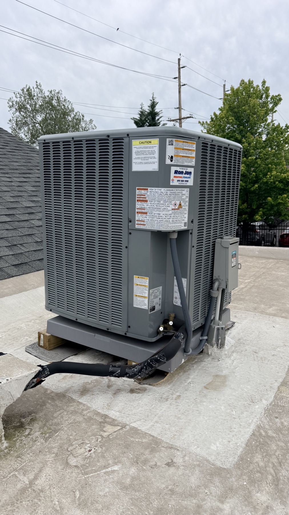 Residential HVAC condensers outside a home